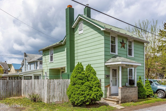 1205 N River Ave, Sunbury, PA 17801 - view of front of property with a chimney and fence