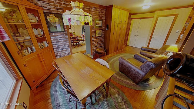 dining space featuring wood-type flooring