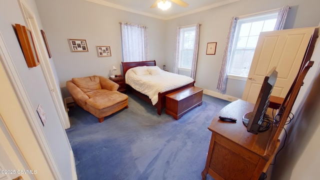 bedroom with dark colored carpet, ornamental molding, a ceiling fan, and baseboards