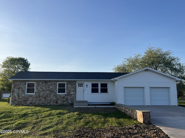 ranch-style home featuring driveway, a front yard, stone siding, an attached garage, and entry steps