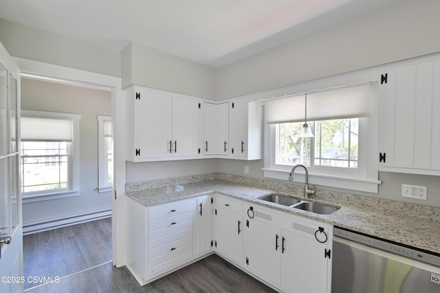 kitchen with stainless steel dishwasher, dark wood-style flooring, a baseboard heating unit, white cabinets, and a sink