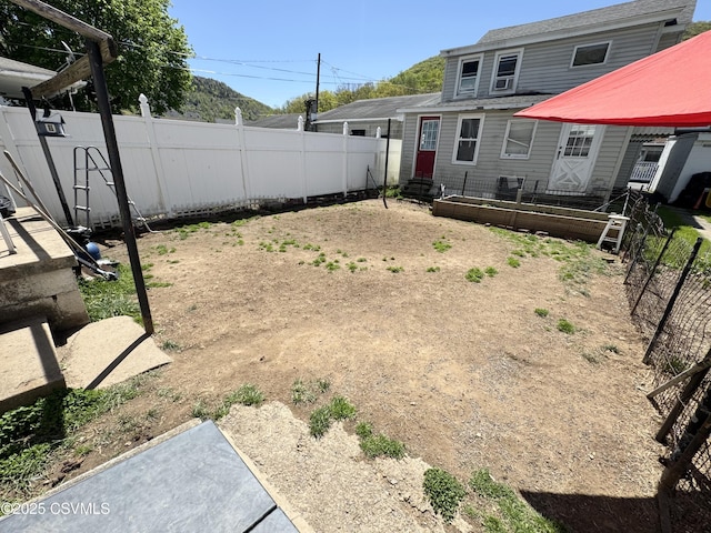 view of yard with fence