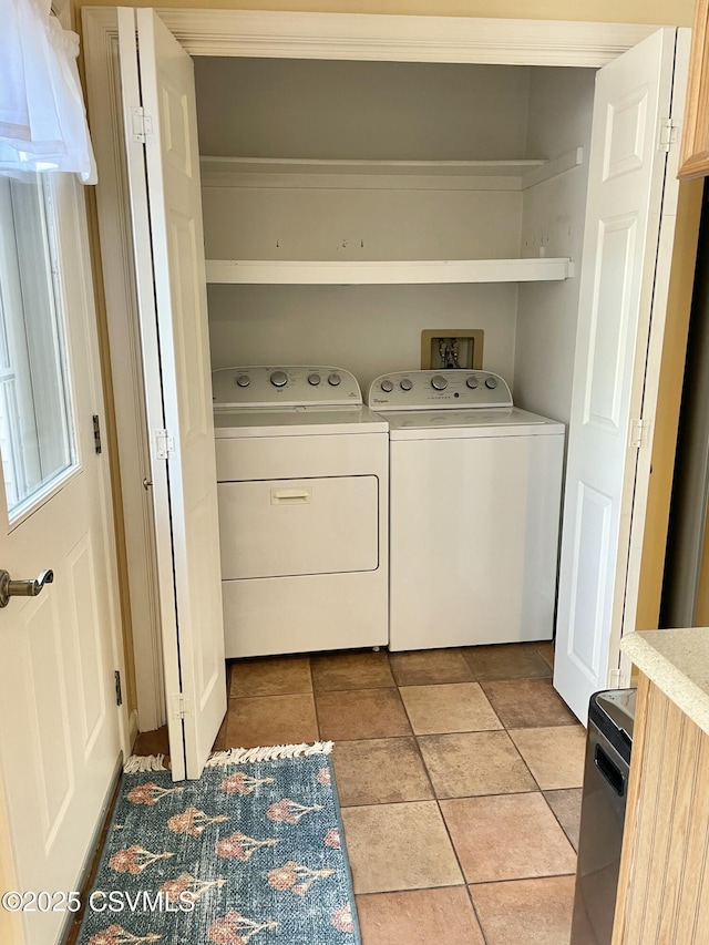 laundry room featuring laundry area and washer and clothes dryer