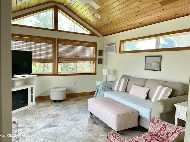 living room with stone finish floor, baseboards, wooden ceiling, a wall unit AC, and vaulted ceiling