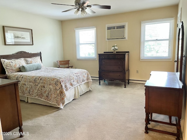 bedroom with light carpet, baseboards, baseboard heating, a wall mounted AC, and a ceiling fan