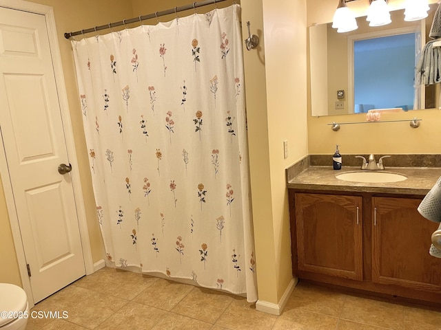 full bathroom with vanity, tile patterned flooring, baseboards, and a shower with curtain