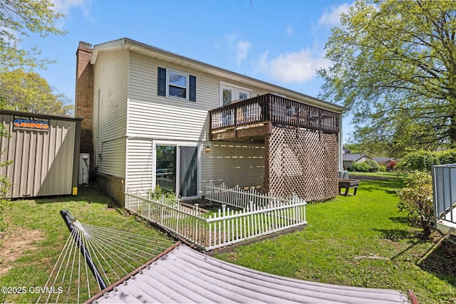 31 Holly Ct, Danville, PA 17821 - back of house with a lawn, a chimney, and a deck