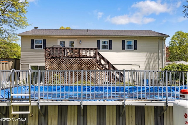31 Holly Ct, Danville, PA 17821 - back of house with a deck and a covered pool
