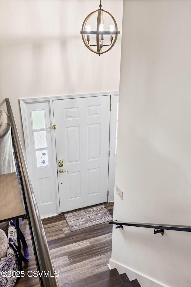 31 Holly Ct, Danville, PA 17821 - entryway with dark wood finished floors and an inviting chandelier