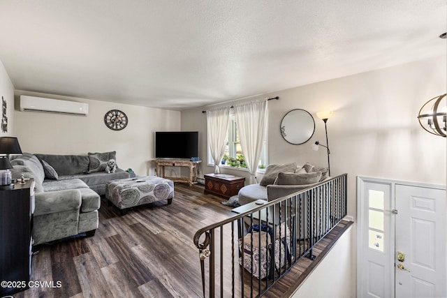 31 Holly Ct, Danville, PA 17821 - living room featuring an inviting chandelier, dark wood-style flooring, and an AC wall unit