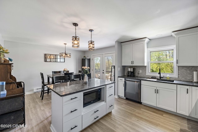 31 Holly Ct, Danville, PA 17821 - kitchen with french doors, a sink, stainless steel dishwasher, light wood-style floors, and black microwave
