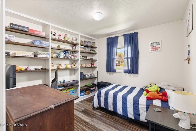 31 Holly Ct, Danville, PA 17821 - bedroom featuring dark wood-style flooring and a textured ceiling