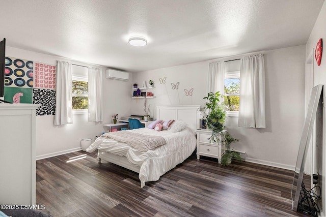 31 Holly Ct, Danville, PA 17821 - bedroom featuring a wall mounted air conditioner, dark wood-type flooring, and multiple windows
