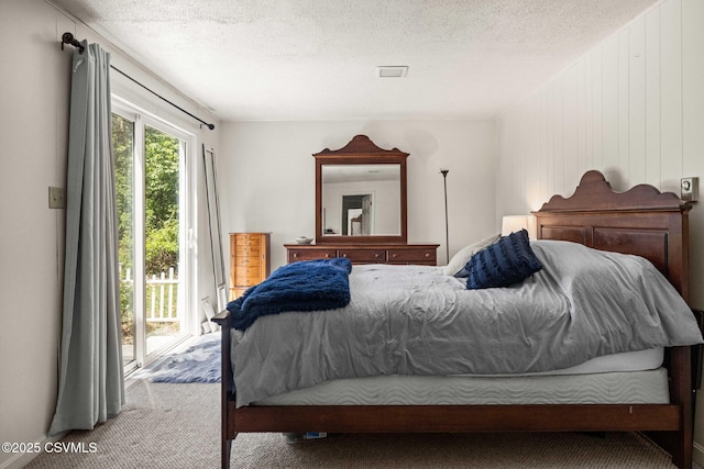 31 Holly Ct, Danville, PA 17821 - carpeted bedroom with access to outside and a textured ceiling