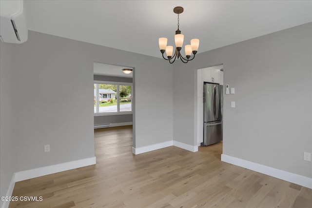92 Valley View Rd, Lewisburg, PA 17837 - unfurnished dining area with a chandelier, a baseboard radiator, baseboards, and light wood-type flooring
