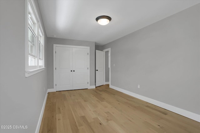 92 Valley View Rd, Lewisburg, PA 17837 - unfurnished bedroom with light wood-style flooring, baseboards, and a closet