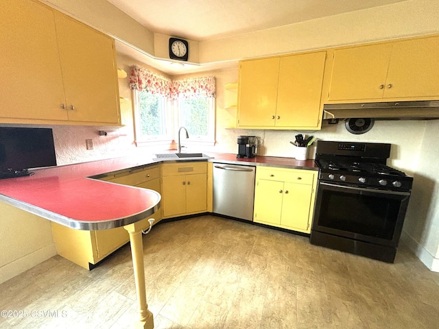 735 E 3rd St, Bloomsburg, PA 17815 - kitchen featuring range with gas stovetop, stainless steel dishwasher, a sink, under cabinet range hood, and light wood finished floors
