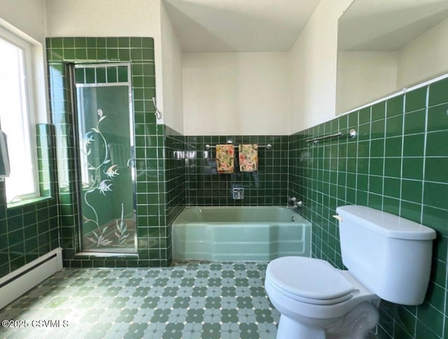 735 E 3rd St, Bloomsburg, PA 17815 - bathroom with baseboard heating, toilet, tile walls, a shower stall, and a garden tub