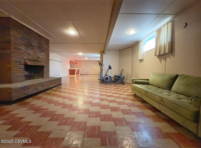 735 E 3rd St, Bloomsburg, PA 17815 - living room featuring light flooring and a brick fireplace