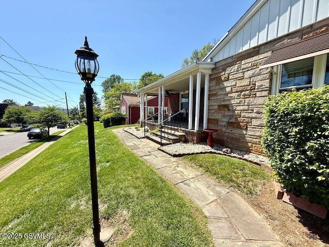 735 E 3rd St, Bloomsburg, PA 17815 - view of grassy yard featuring covered porch