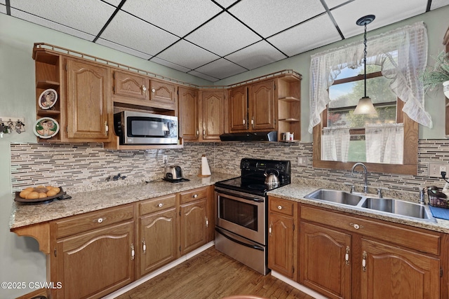 341 Dewart St, Danville, PA 17821 - kitchen with open shelves, stainless steel appliances, a sink, light wood finished floors, and a drop ceiling
