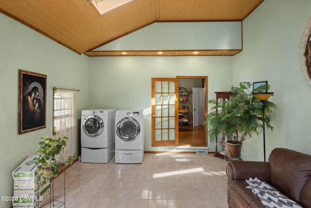 341 Dewart St, Danville, PA 17821 - laundry room with washer and dryer, wood ceiling, and tile patterned flooring