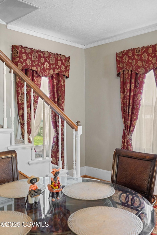 341 Dewart St, Danville, PA 17821 - sitting room with stairway, crown molding, a textured ceiling, and baseboards