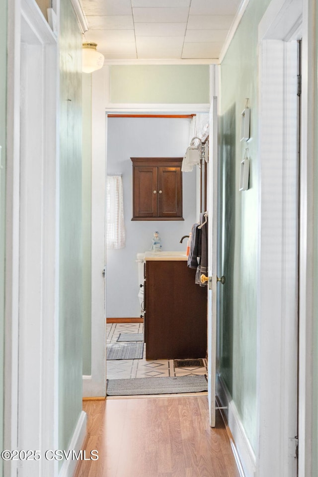 341 Dewart St, Danville, PA 17821 - bathroom with wood finished floors, vanity, and baseboards