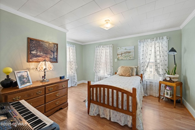 341 Dewart St, Danville, PA 17821 - bedroom featuring crown molding, light wood-type flooring, and baseboards