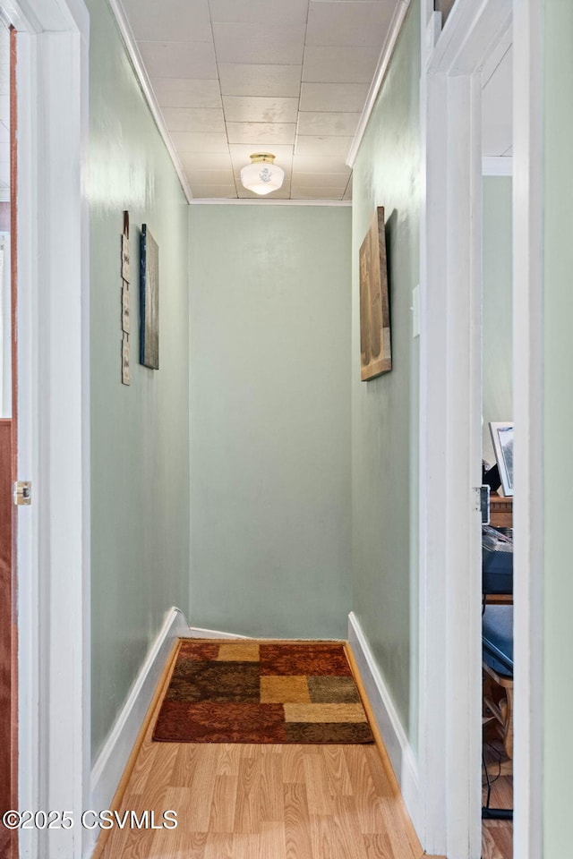 341 Dewart St, Danville, PA 17821 - corridor with baseboards, wood finished floors, and ornamental molding