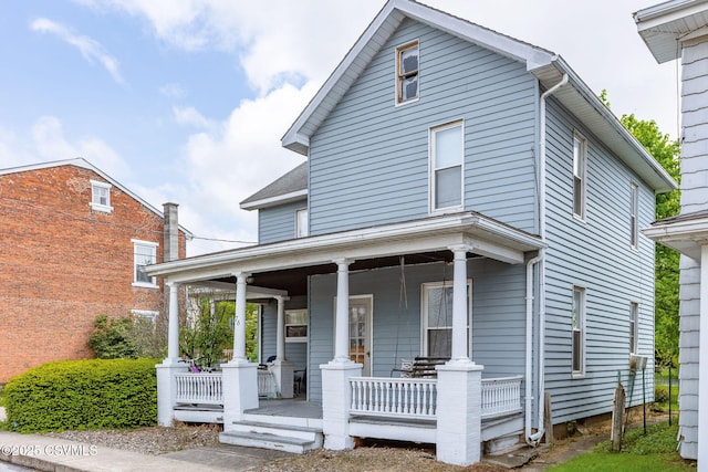 276 3rd St, New Columbia, PA 17856 - view of front of property featuring covered porch