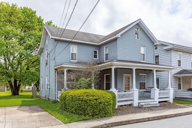 276 3rd St, New Columbia, PA 17856 - view of front facade featuring covered porch and roof with shingles