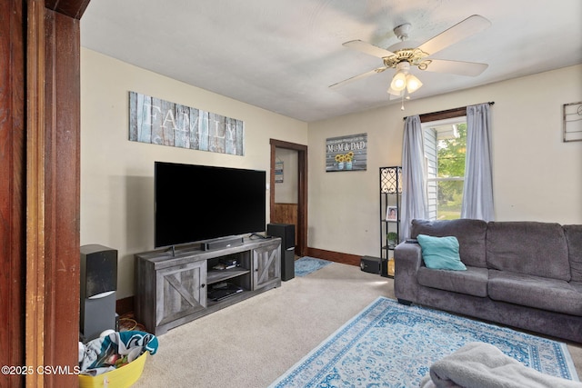 276 3rd St, New Columbia, PA 17856 - living room featuring carpet, a ceiling fan, and baseboards
