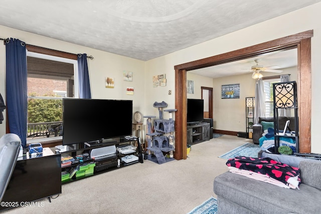 276 3rd St, New Columbia, PA 17856 - living room featuring carpet floors, a textured ceiling, and a ceiling fan