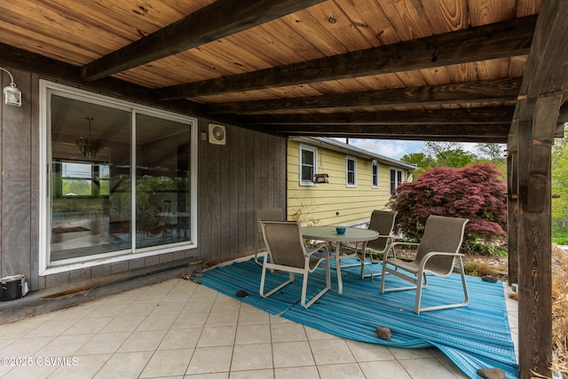 deck with a patio and outdoor dining space
