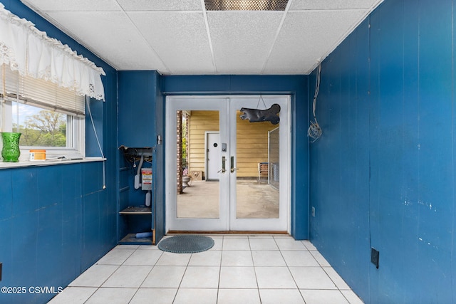 view of exterior entry featuring french doors