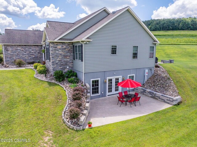 357 Lick Run Rd, Bloomsburg, PA 17815 - back of house featuring french doors, a patio area, and a yard