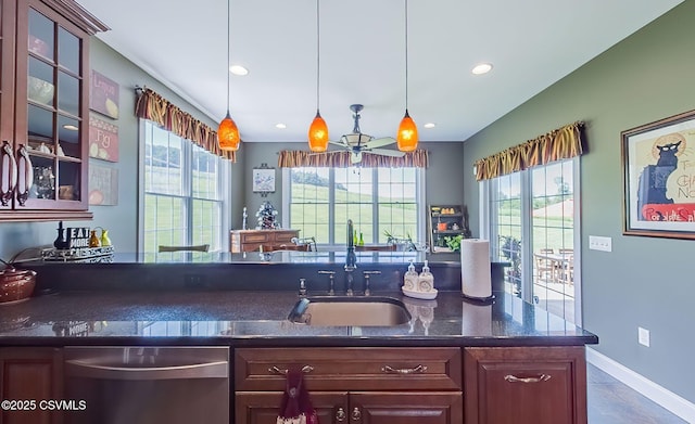 357 Lick Run Rd, Bloomsburg, PA 17815 - bar area featuring a sink, dishwasher, plenty of natural light, recessed lighting, and baseboards
