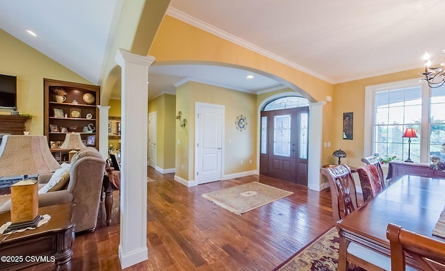 357 Lick Run Rd, Bloomsburg, PA 17815 - foyer with arched walkways, ornate columns, crown molding, baseboards, and wood finished floors