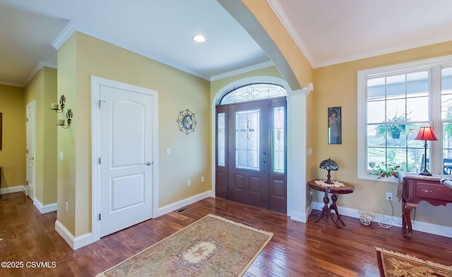 357 Lick Run Rd, Bloomsburg, PA 17815 - foyer entrance with arched walkways, ornamental molding, wood finished floors, and baseboards