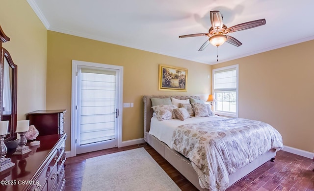 357 Lick Run Rd, Bloomsburg, PA 17815 - bedroom with ornamental molding, baseboards, dark wood-style flooring, and a ceiling fan