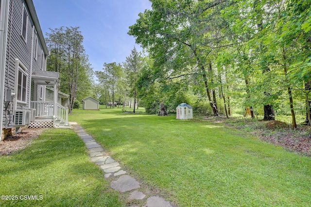 120 Geise St, Sunbury, PA 17801 - view of grassy yard featuring a shed and an outbuilding