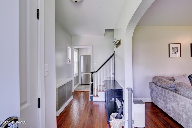 120 Geise St, Sunbury, PA 17801 - foyer with arched walkways, stairs, and a fireplace