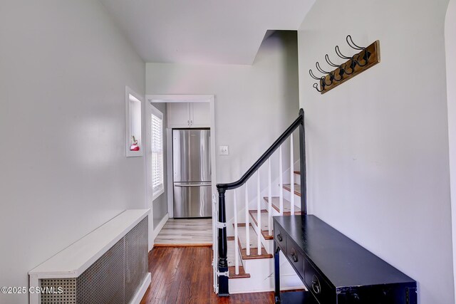 120 Geise St, Sunbury, PA 17801 - entryway with dark wood-style floors, radiator, and stairs