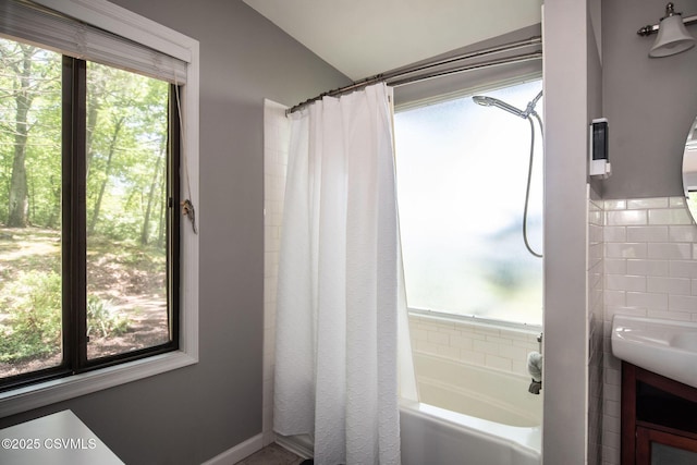 78 Trillium Ln, Danville, PA 17821 - bathroom featuring vanity, a bathtub, curtained shower, and tile walls