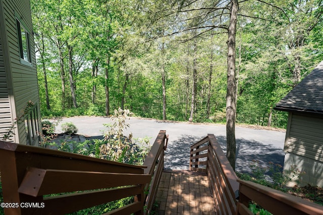 78 Trillium Ln, Danville, PA 17821 - wooden deck with a wooded view