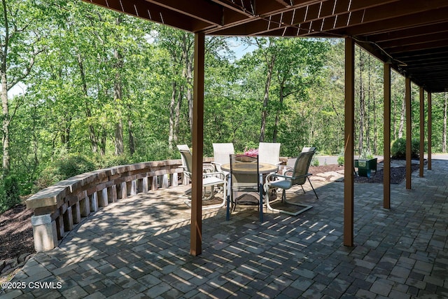 78 Trillium Ln, Danville, PA 17821 - view of patio with outdoor dining space and a view of trees