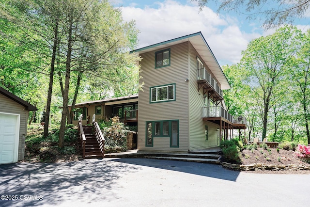 78 Trillium Ln, Danville, PA 17821 - back of property featuring a balcony and stairway