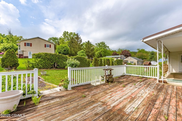 deck featuring a yard