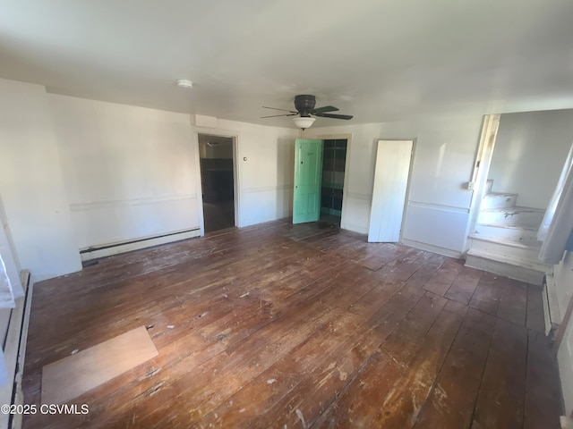 unfurnished bedroom featuring a baseboard heating unit, hardwood / wood-style floors, and ceiling fan